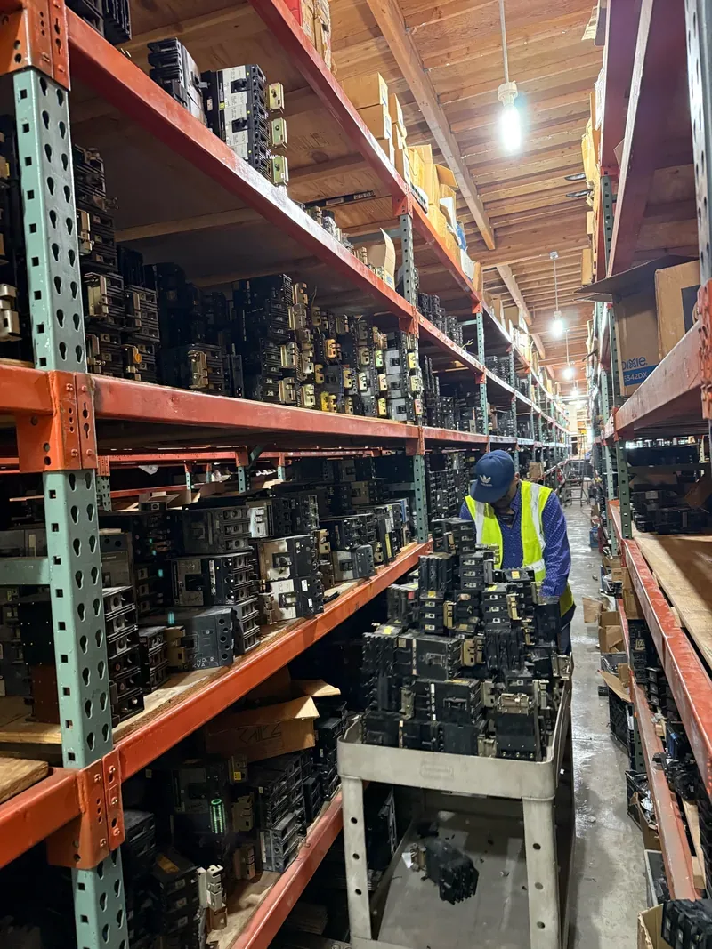 Aisle of shelved circuit breakers in a warehouse — Danbury, CT