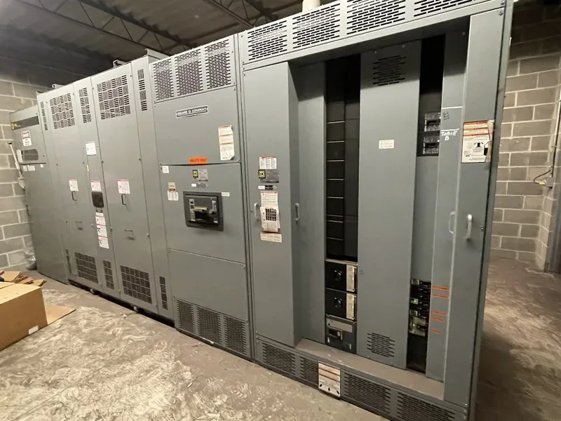 Medium-voltage switchgear line-up staged in a warehouse — Springfield, MA