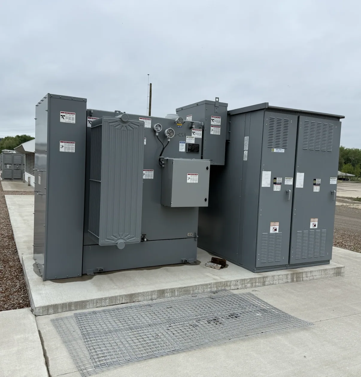 Pad-mount transformer and switching cabinet on a finished pad — Bridgeport, CT